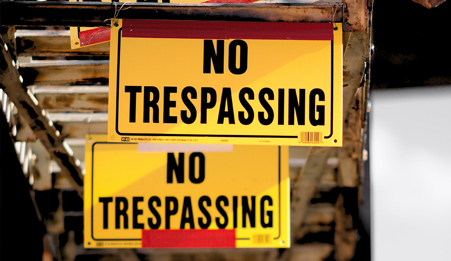 Two no trespassing signs